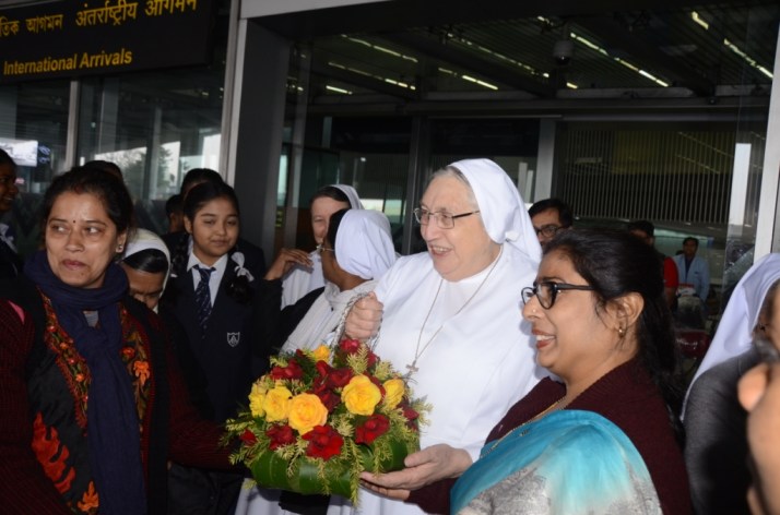 welcome by the past pupils at the airport.JPG